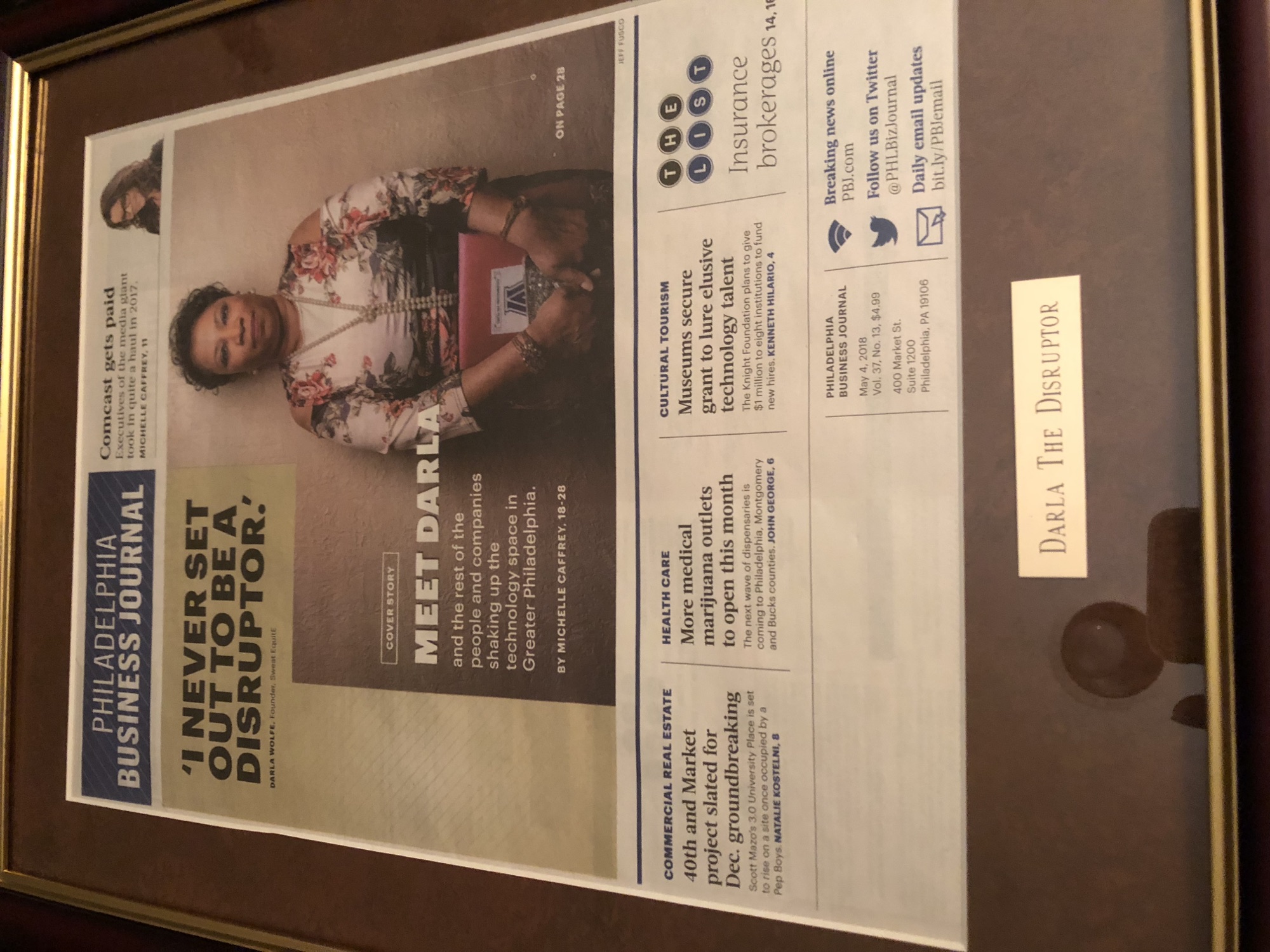 Framed Philadelphia Business Journal cover featuring Darla Wolfe